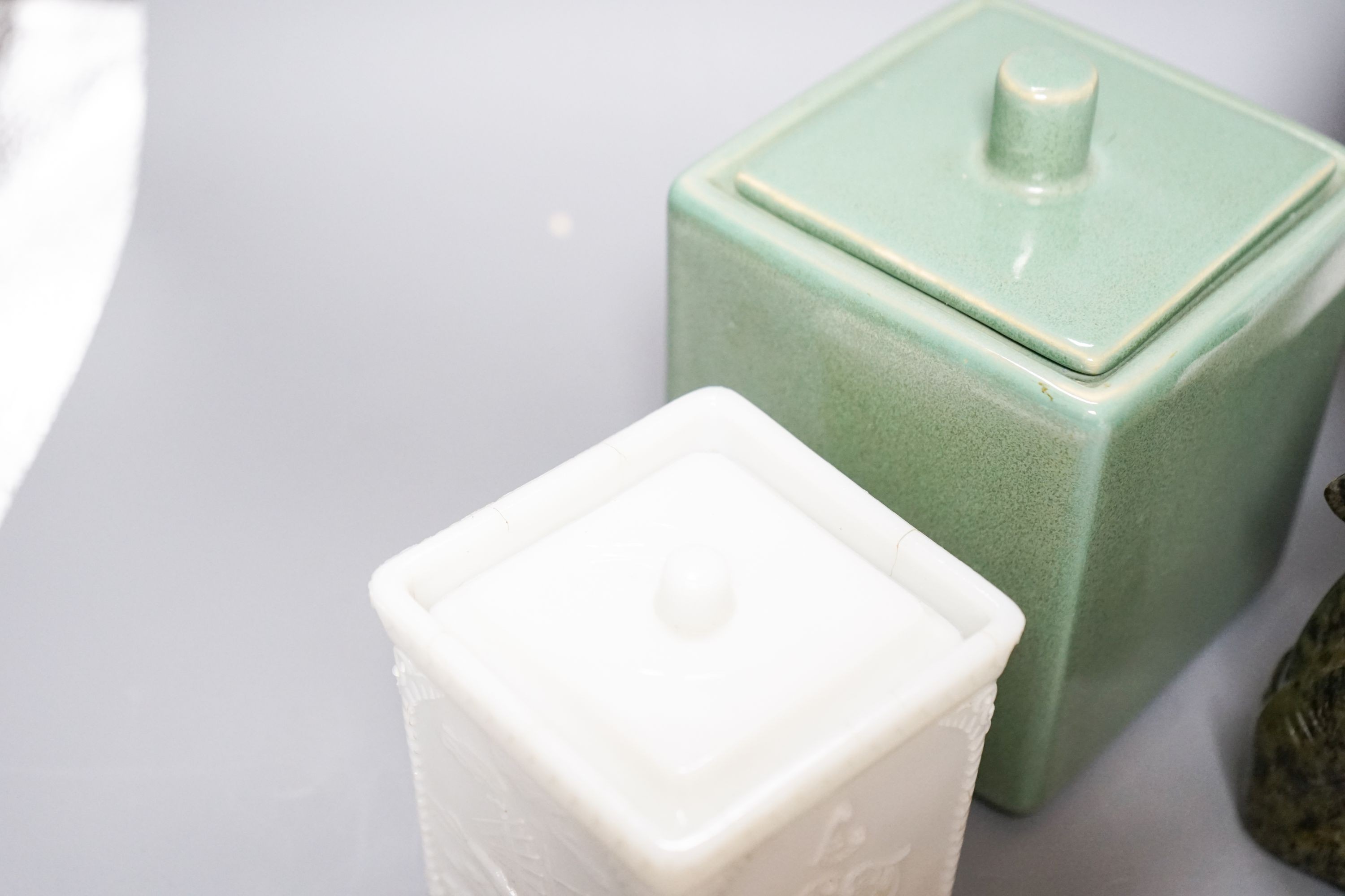 A Suprematist style porcelain plate, 24cm, a powder blue trinket box, two jars and covers and a hardstone figure of a rabbit